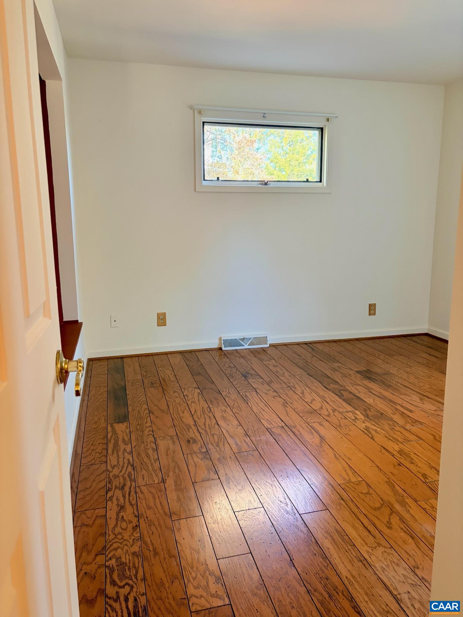 699 Winton Road Amherst, VA 24521 - Photo 24 of 35 an empty room with wooden floor