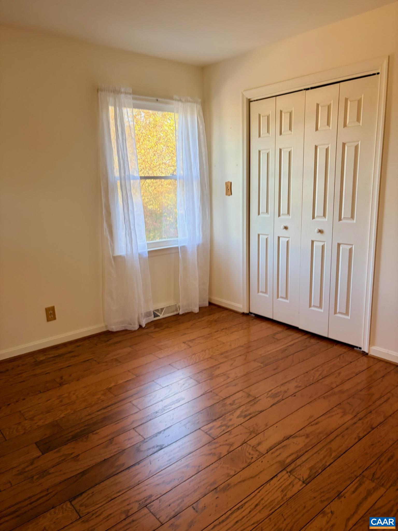 699 Winton Road Amherst, VA 24521 - Photo 26 of 35 a view of wooden floor and windows in a room