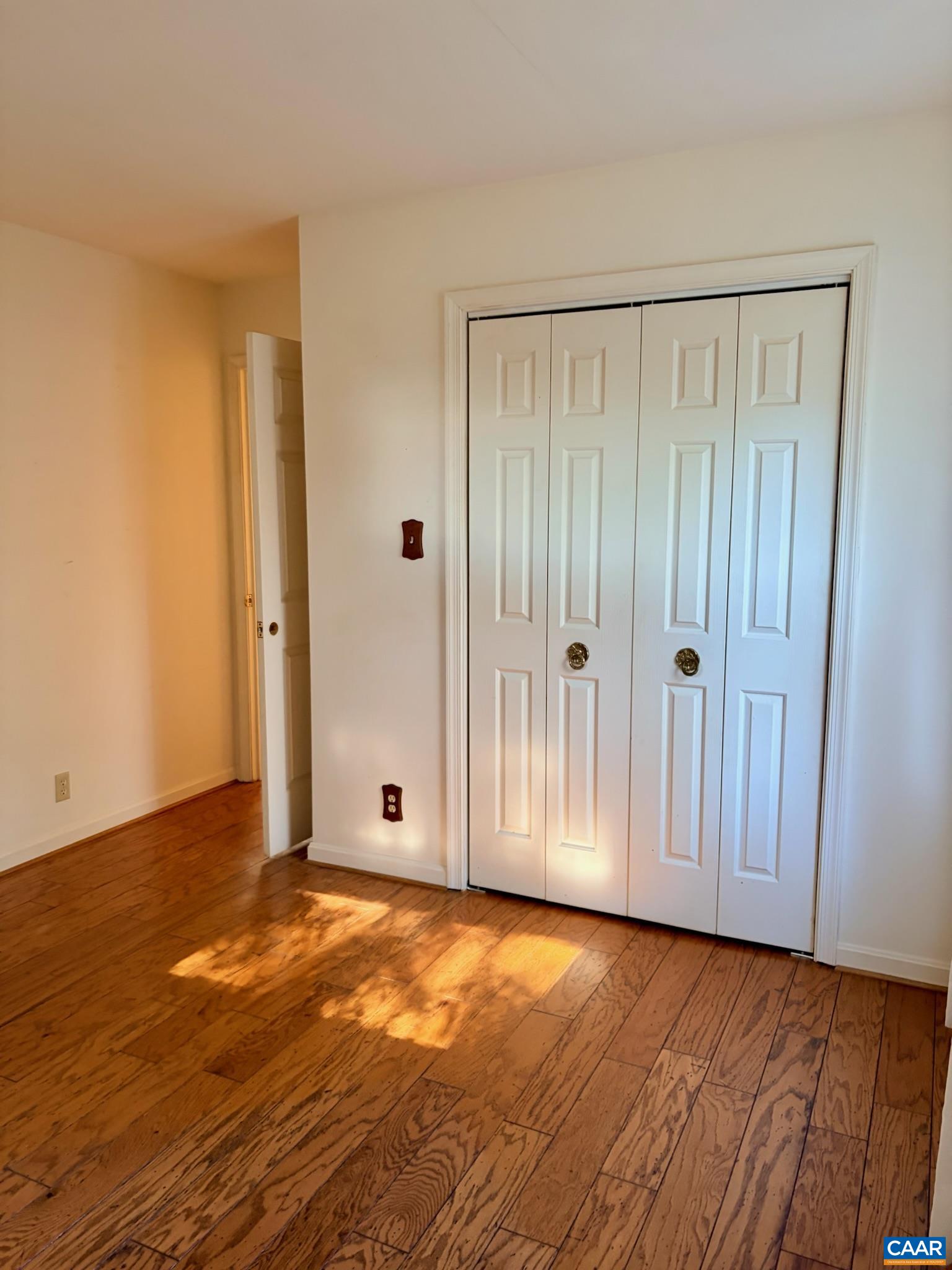 699 Winton Road Amherst, VA 24521 - Photo 32 of 35 a view of an empty room with wooden floor