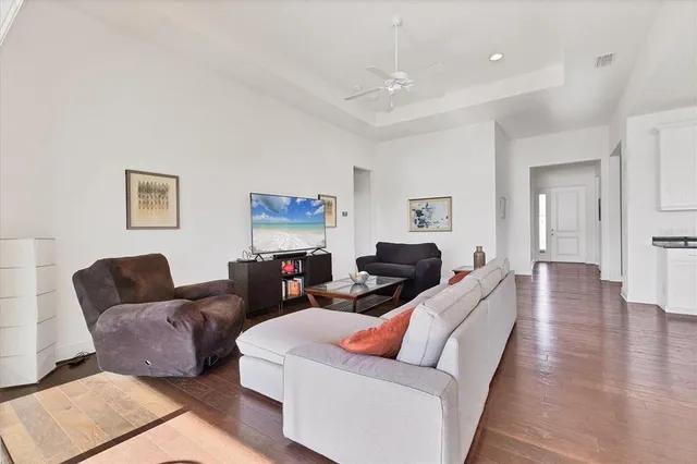 a living room with furniture and a couch