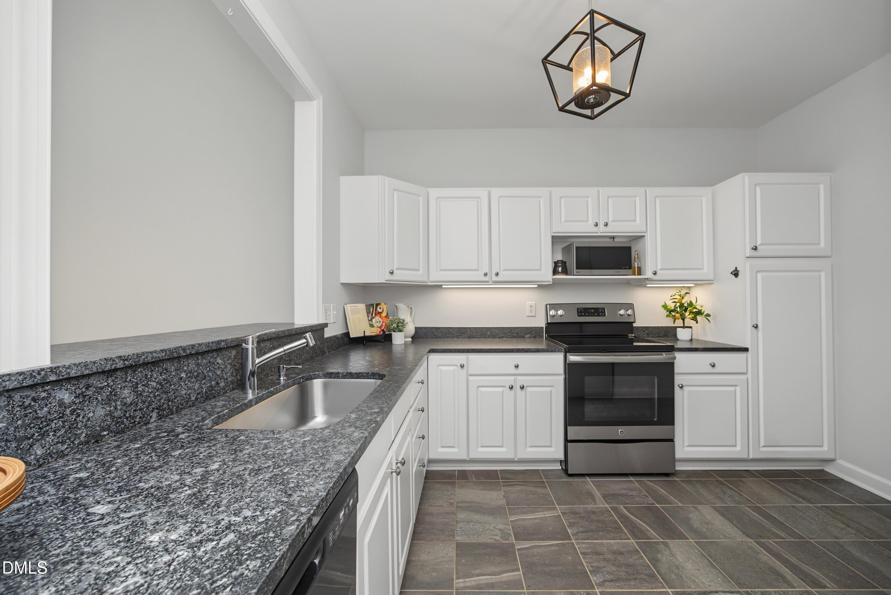 8725 Courage Court Raleigh, NC 27615 - Photo 7 of 41 10Kitchen
