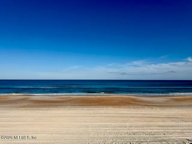 a view of a room with an ocean view