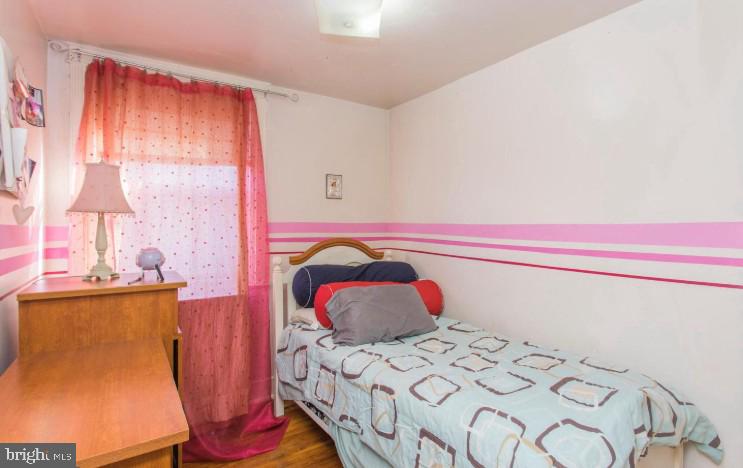 125 Heather Road Upper Darby, PA 19082 - Photo 12 of 15 a bedroom with a bed and a window