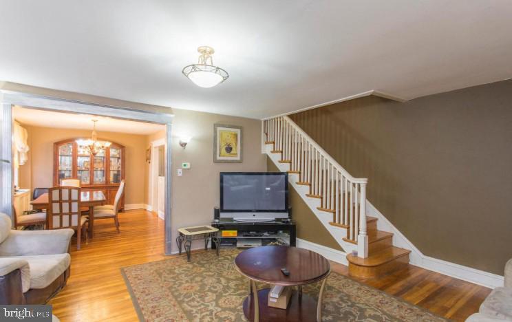 125 Heather Road Upper Darby, PA 19082 - Photo 4 of 15 a view of livingroom with furniture and staircase