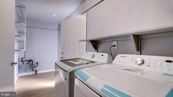 a bedroom with a bed and a cabinets