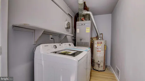 a utility room with dryer and washer