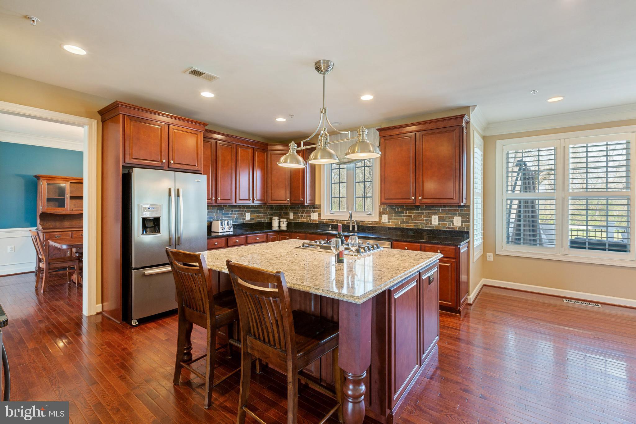 20240 McNamara Road Poolesville, MD 20837 - Photo 11 of 59 Kitchen with SS appliances