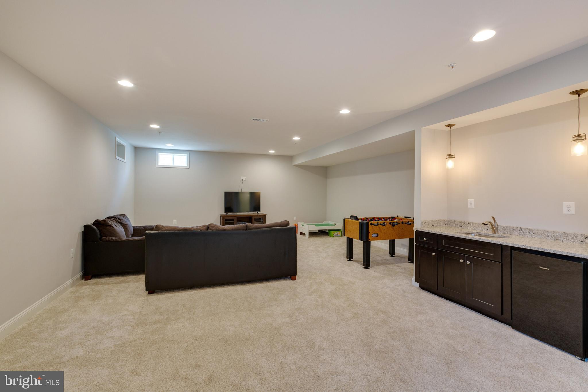 20240 McNamara Road Poolesville, MD 20837 - Photo 41 of 59 Lower level Recreation Room with wet bar