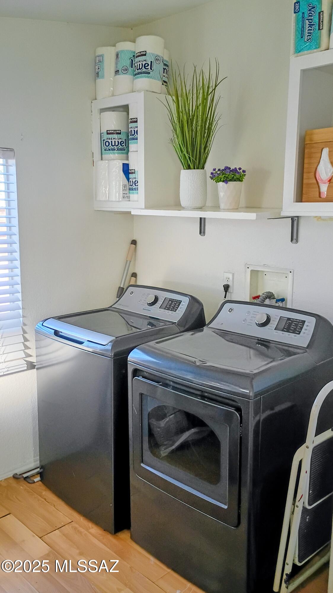 1449 West Hualpai Road Tucson, AZ 85745 - Photo 26 of 49 a utility room with dryer and washer