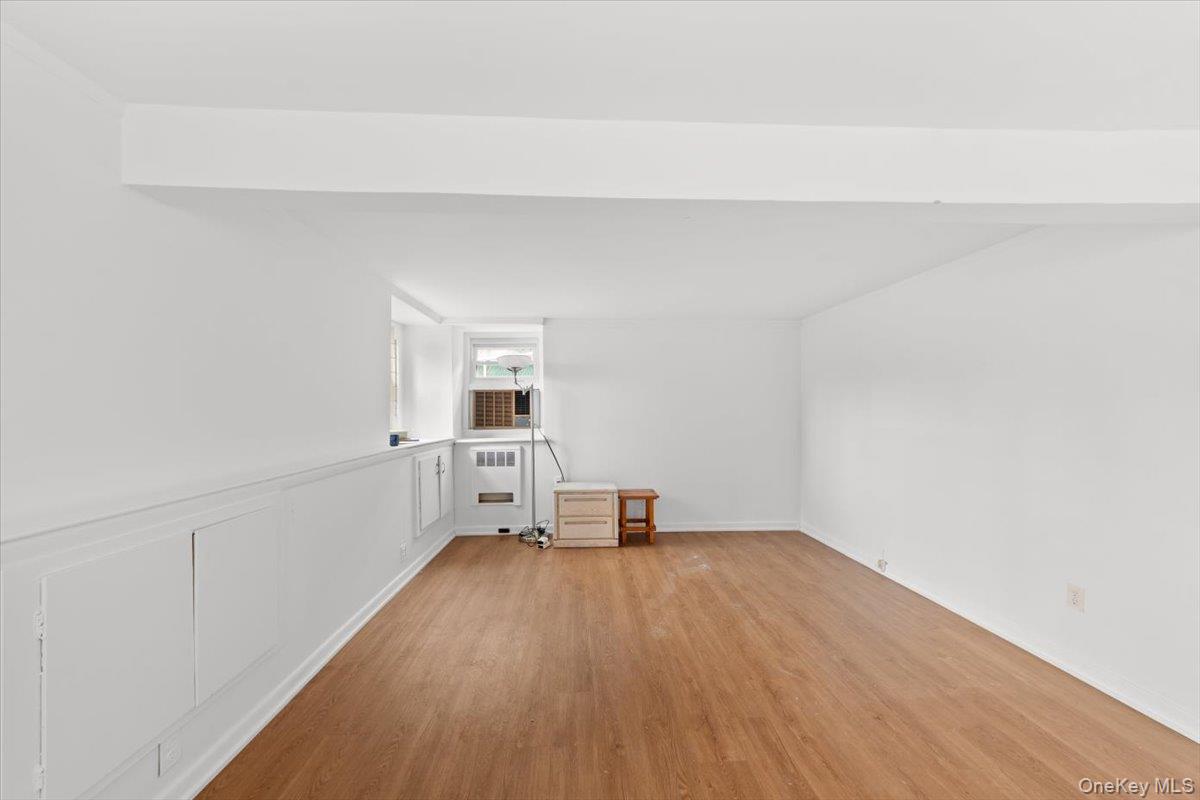 5824 Fieldston Road Bronx, NY 10471 - Photo 20 of 27 a view of empty room with wooden floor