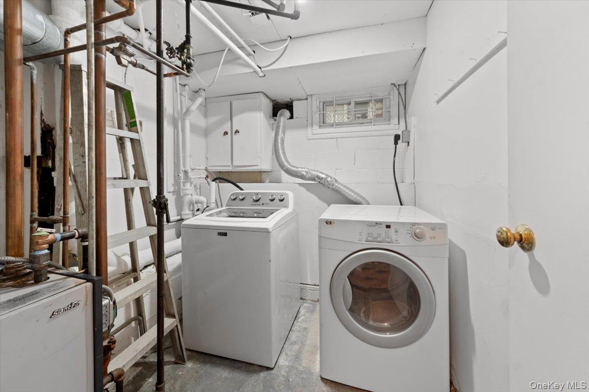 5824 Fieldston Road Bronx, NY 10471 - Photo 27 of 27 a utility room with dryer and washer