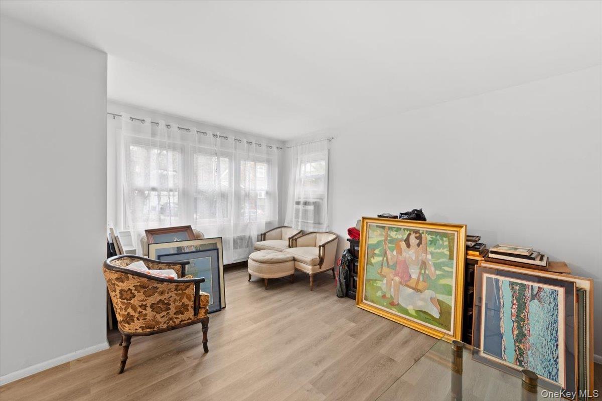 5824 Fieldston Road Bronx, NY 10471 - Photo 6 of 27 a living room with furniture and a window