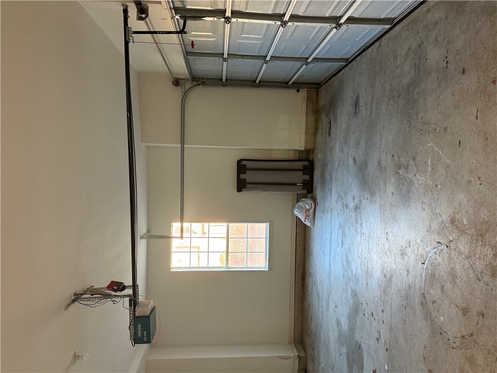 1425 West Villa Maria Road, Unit 306 Bryan, TX 77801 - Photo 10 of 21 an empty room with windows