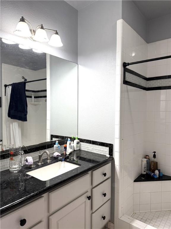 1425 West Villa Maria Road, Unit 306 Bryan, TX 77801 - Photo 19 of 21 a bathroom with a sink and a mirror