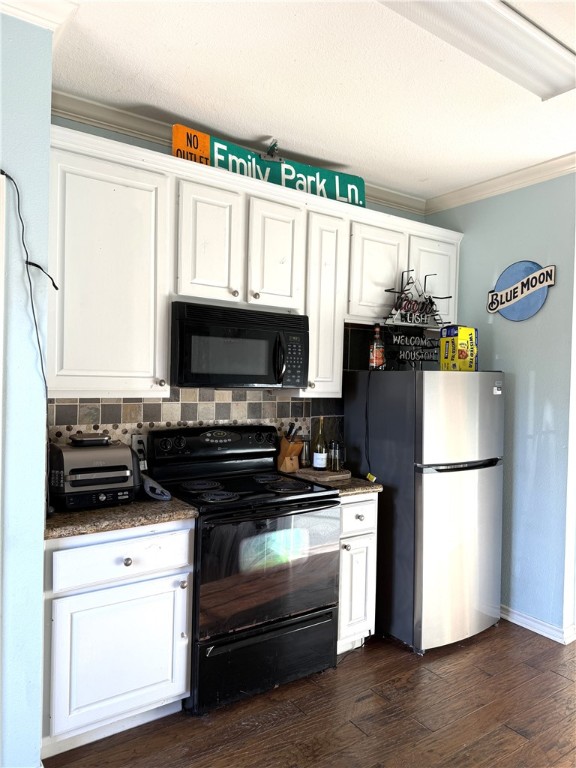 1425 West Villa Maria Road, Unit 306 Bryan, TX 77801 - Photo 7 of 21 a kitchen with a refrigerator stove and microwave