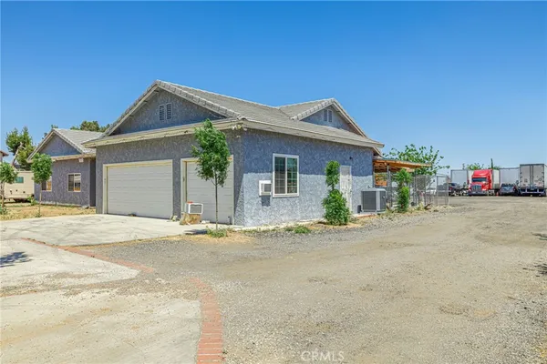 a house with trees in front of it