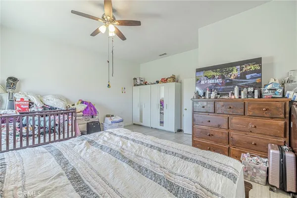 a kids room with toys and a book shelf