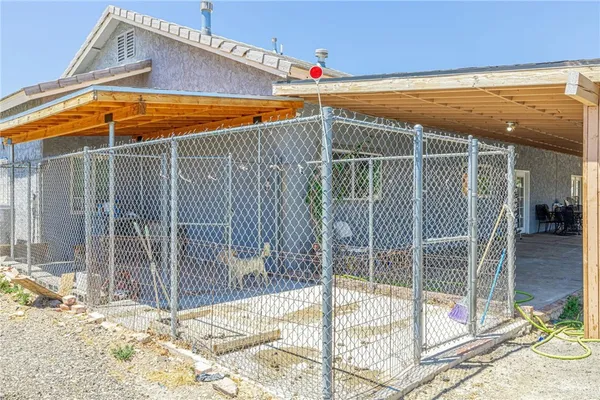 front view of a house with a yard and garage