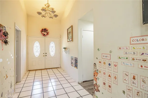 a view of a hallway with front door