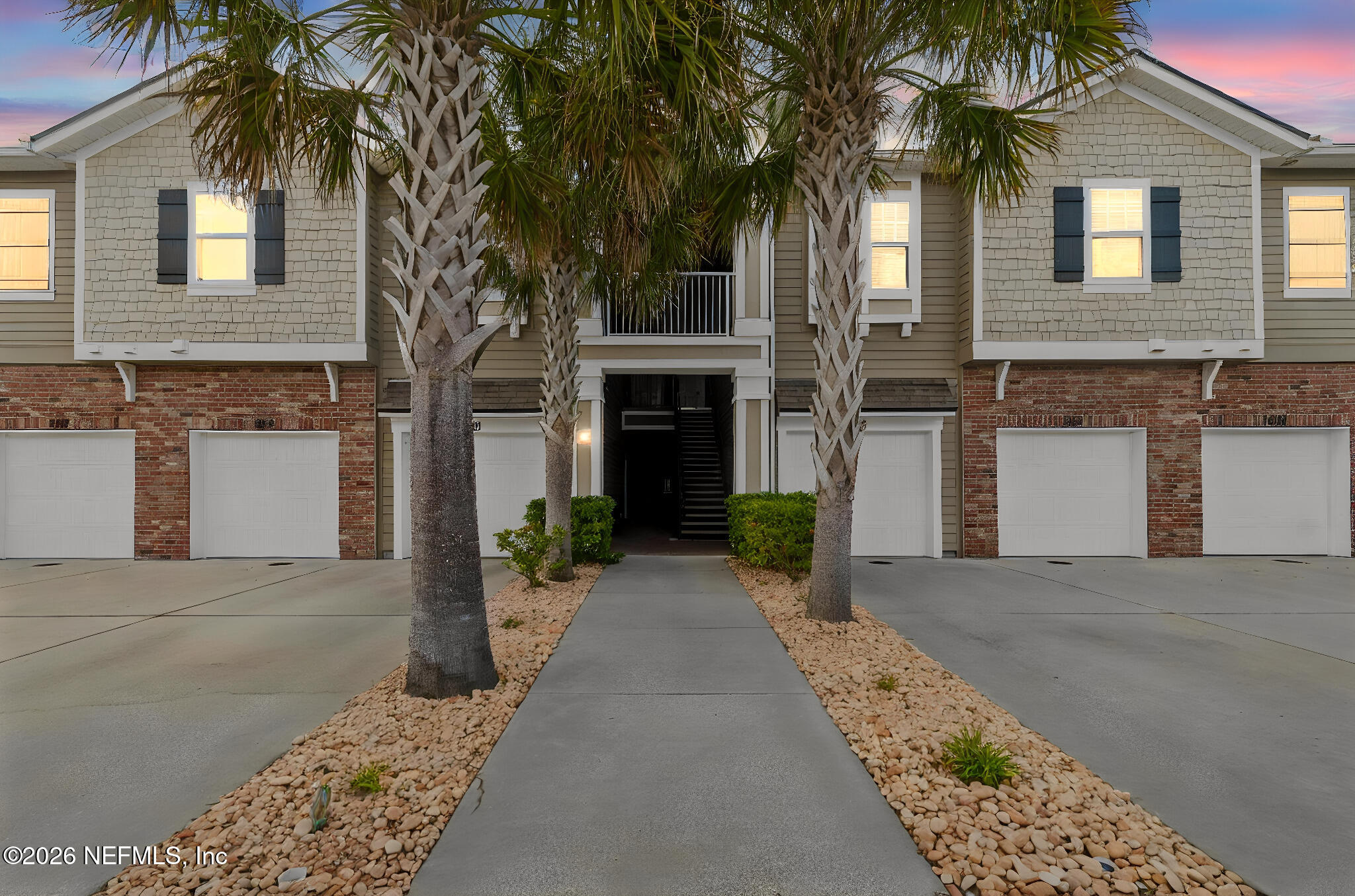 2113 Golden Lake Loop St. Augustine, FL 32084 - Photo 1 of 50 a front view of a house with a yard and garage