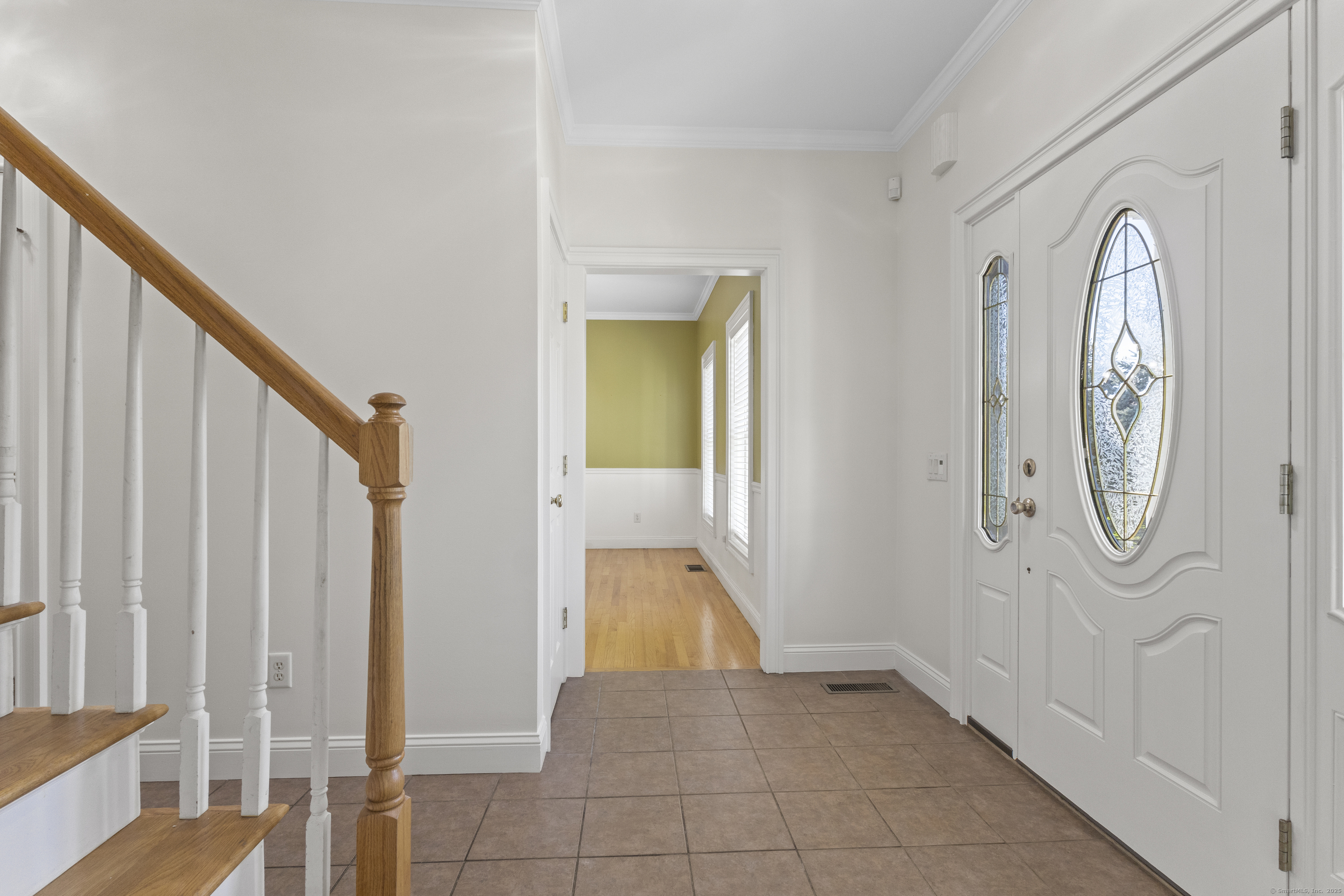 5 Two Mile Hill Road Waterford, CT 06385 - Photo 2 of 21 a view of a hallway with windows and entryway