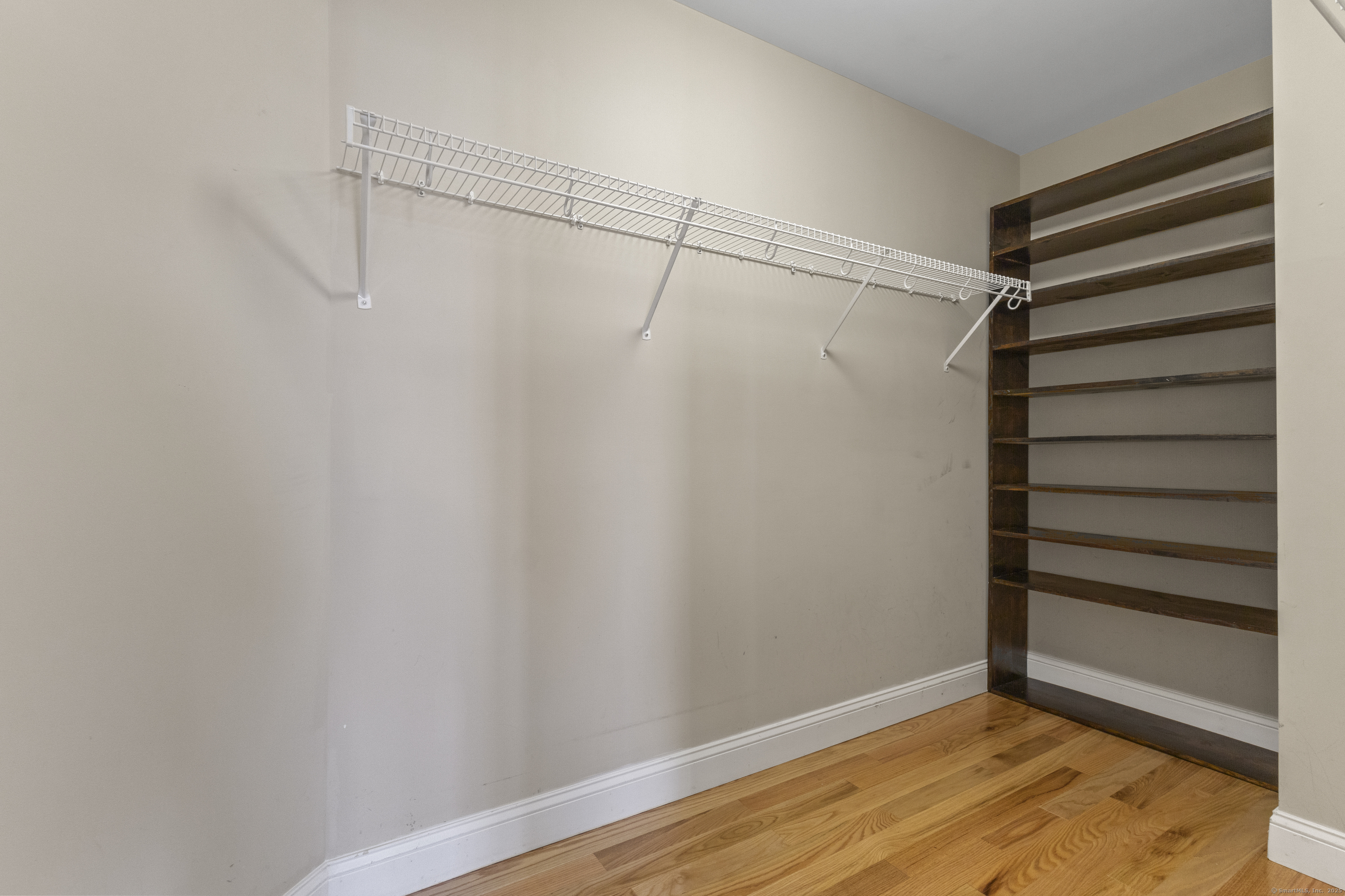 5 Two Mile Hill Road Waterford, CT 06385 - Photo 10 of 21 a view of a room with wooden floor