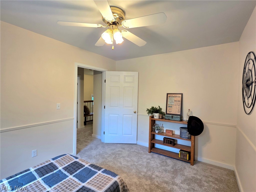 398 North Chillicothe Road Aurora, OH 44202 - Photo 23 of 39 Room featuring neutral-toned walls, white chair rail molding, and plush carpeting