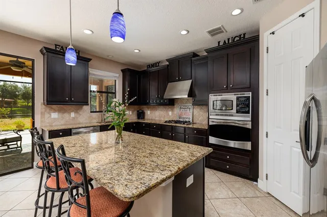 $975,000 | 4611 Grand Preserve Place, Palm Harbor, FL 34684