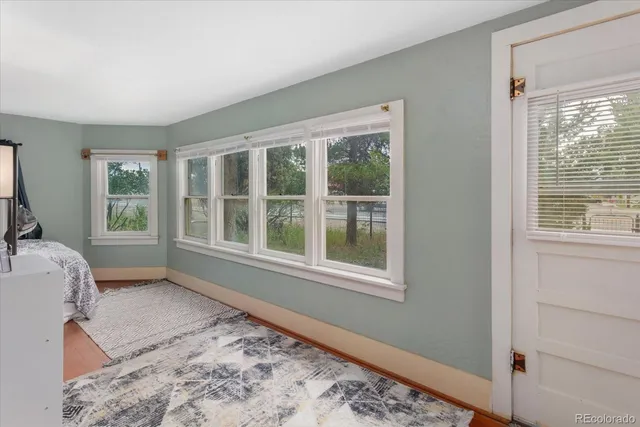 a view of livingroom with furniture and window