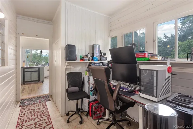 a room with furniture and a mirror