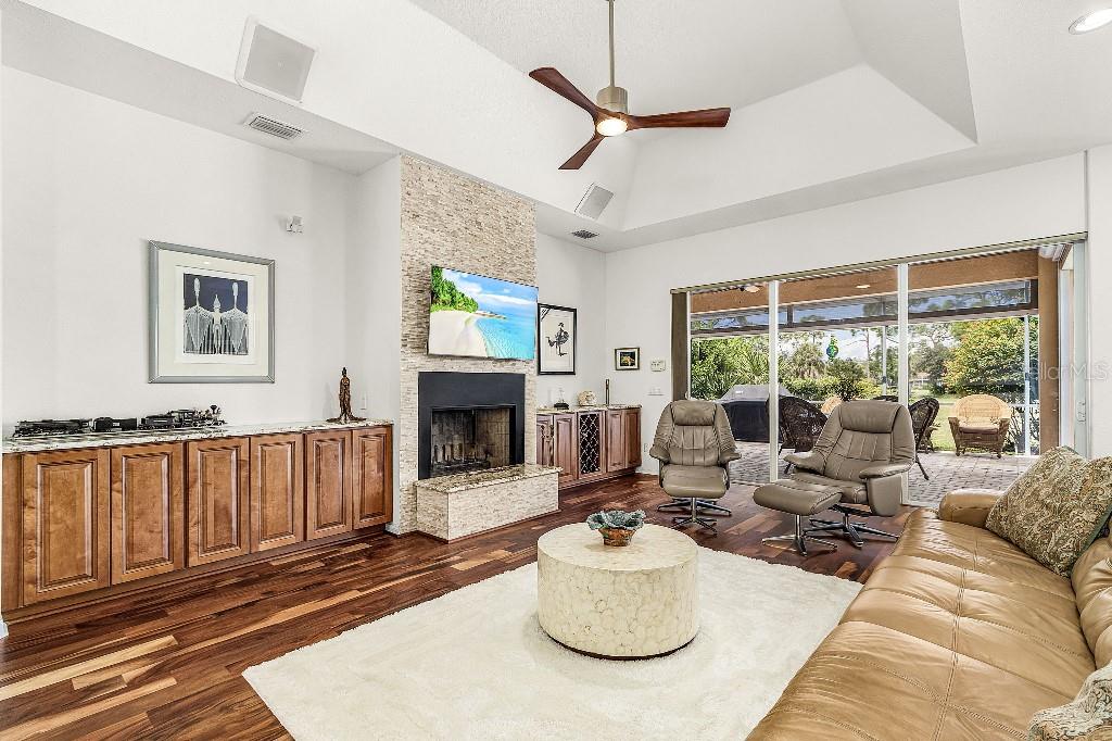 4001 Marianne Key Road Punta Gorda, FL 33955 - Photo 18 of 29 a living room with furniture fireplace and a large window
