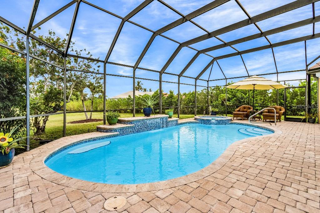 4001 Marianne Key Road Punta Gorda, FL 33955 - Photo 25 of 29 a view of a swimming pool with a patio