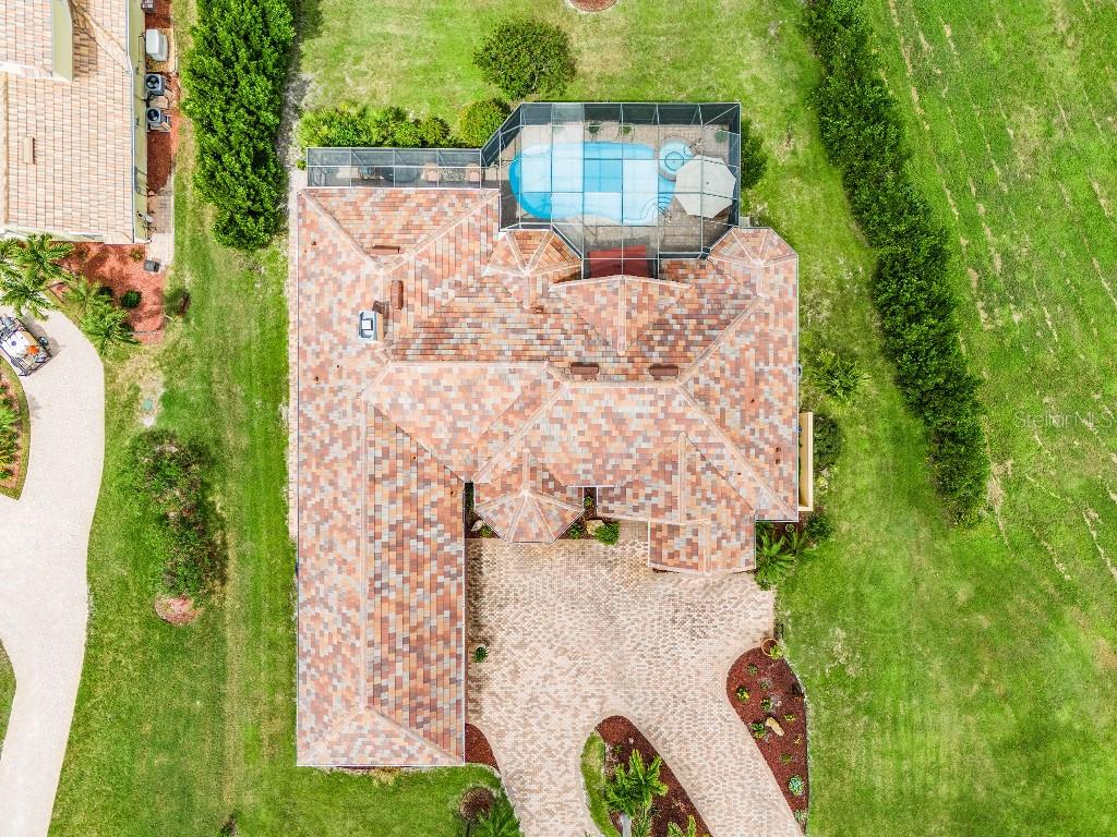 4001 Marianne Key Road Punta Gorda, FL 33955 - Photo 28 of 29 swimming pool view with a garden