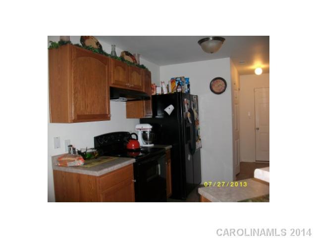 8624 Rockmoor Ridge Road Charlotte, NC 28215 - Photo 2 of 7 a black and white photo of a room