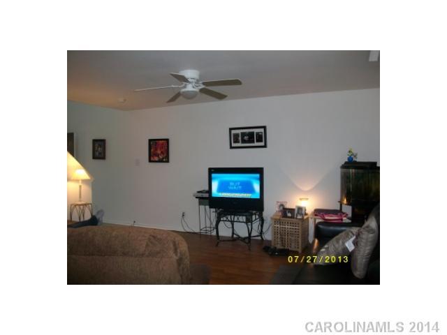8624 Rockmoor Ridge Road Charlotte, NC 28215 - Photo 5 of 7 a black and white photo of a living room