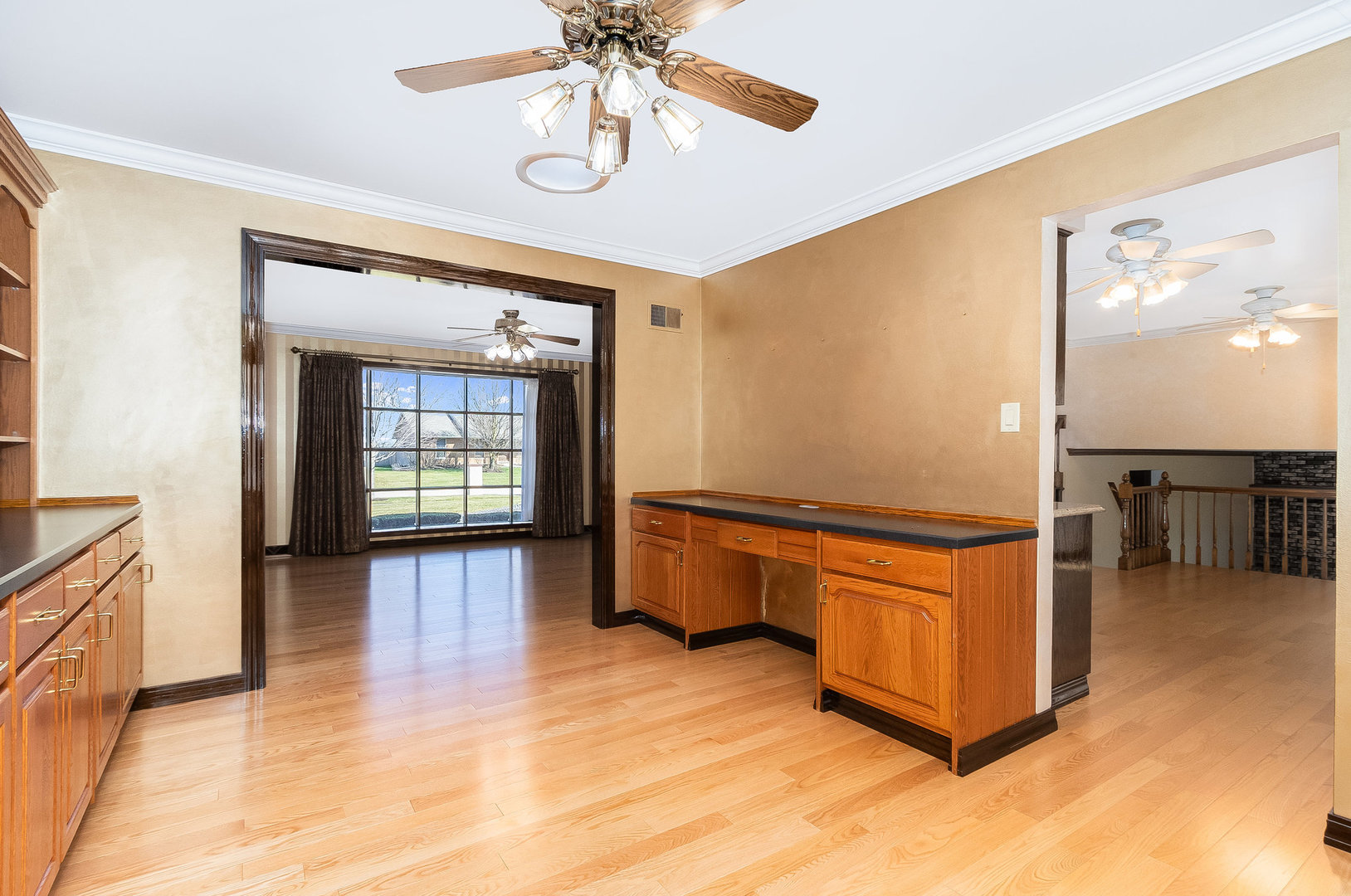 25121 West Willow Drive Plainfield, IL 60544 - Photo 11 of 28 a kitchen with stainless steel appliances granite countertop a stove and a refrigerator