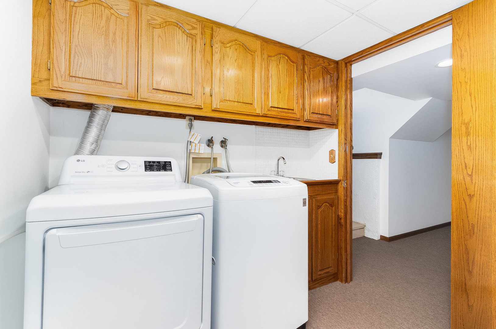 25121 West Willow Drive Plainfield, IL 60544 - Photo 23 of 28 a utility room with dryer and washer