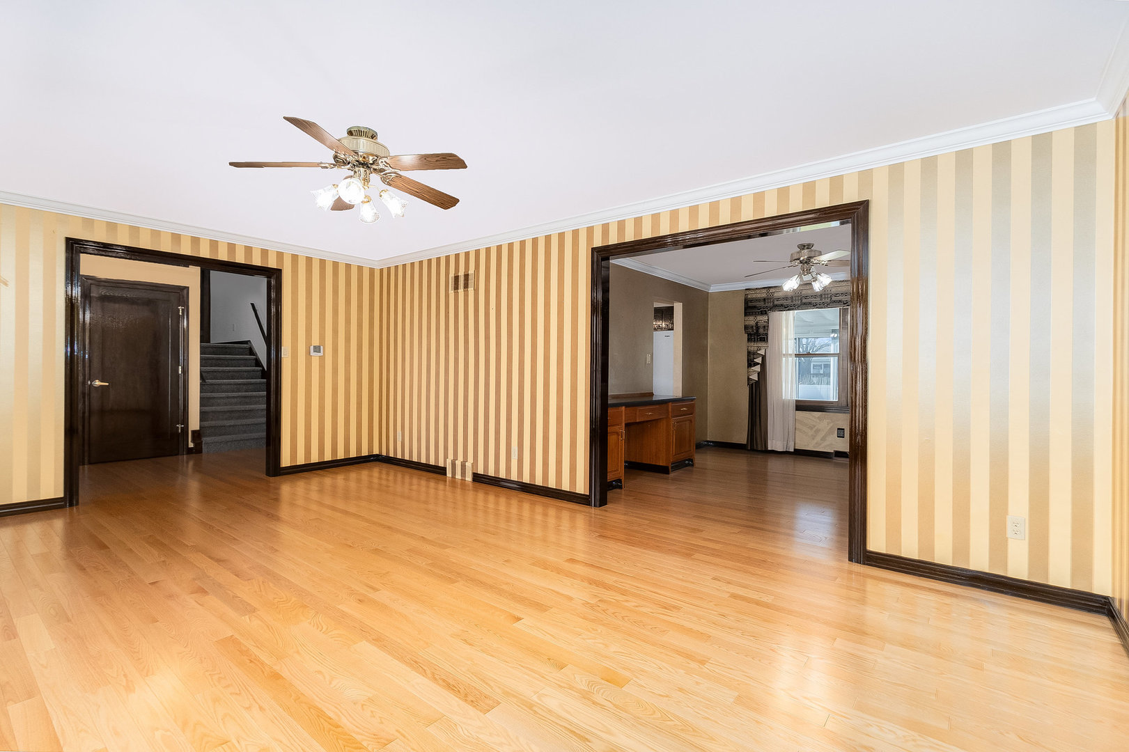 25121 West Willow Drive Plainfield, IL 60544 - Photo 5 of 28 an empty room with closet and a chandelier fan