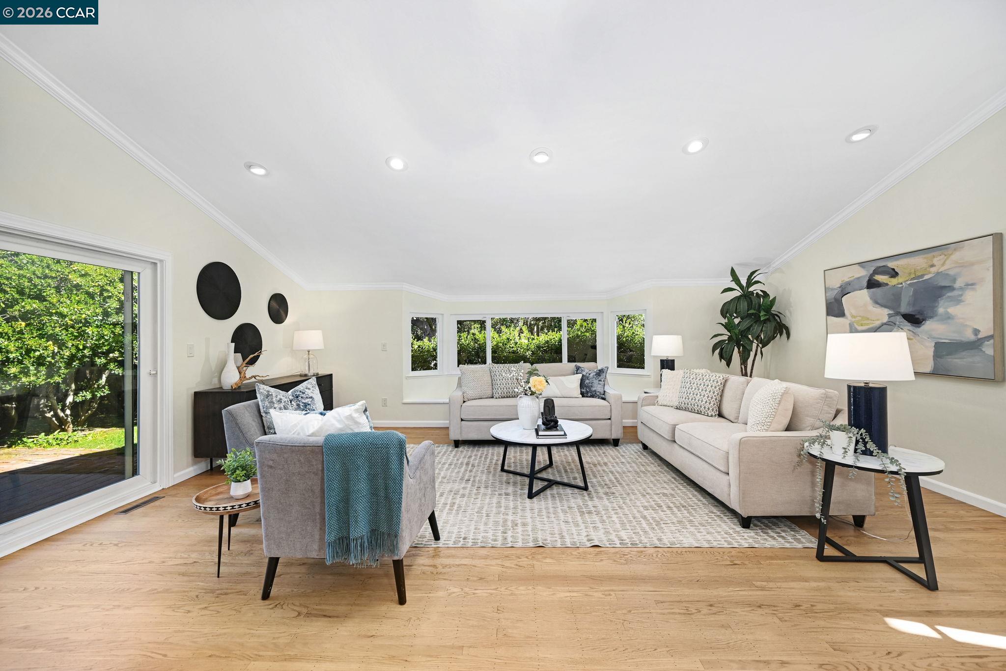 414 Peppertree Road Walnut Creek, CA 94598 - Photo 15 of 49 a living room with furniture and a large window