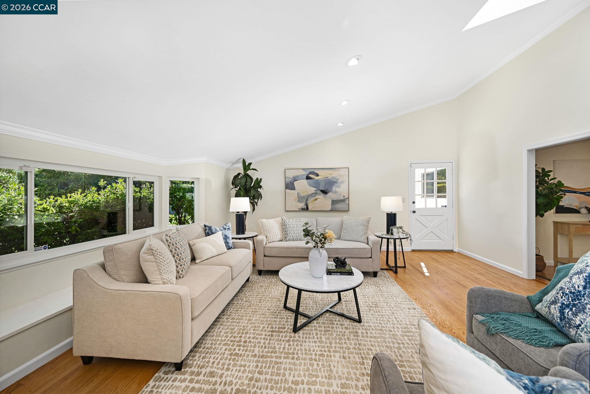 414 Peppertree Road Walnut Creek, CA 94598 - Photo 17 of 49 a living room with furniture and a large window