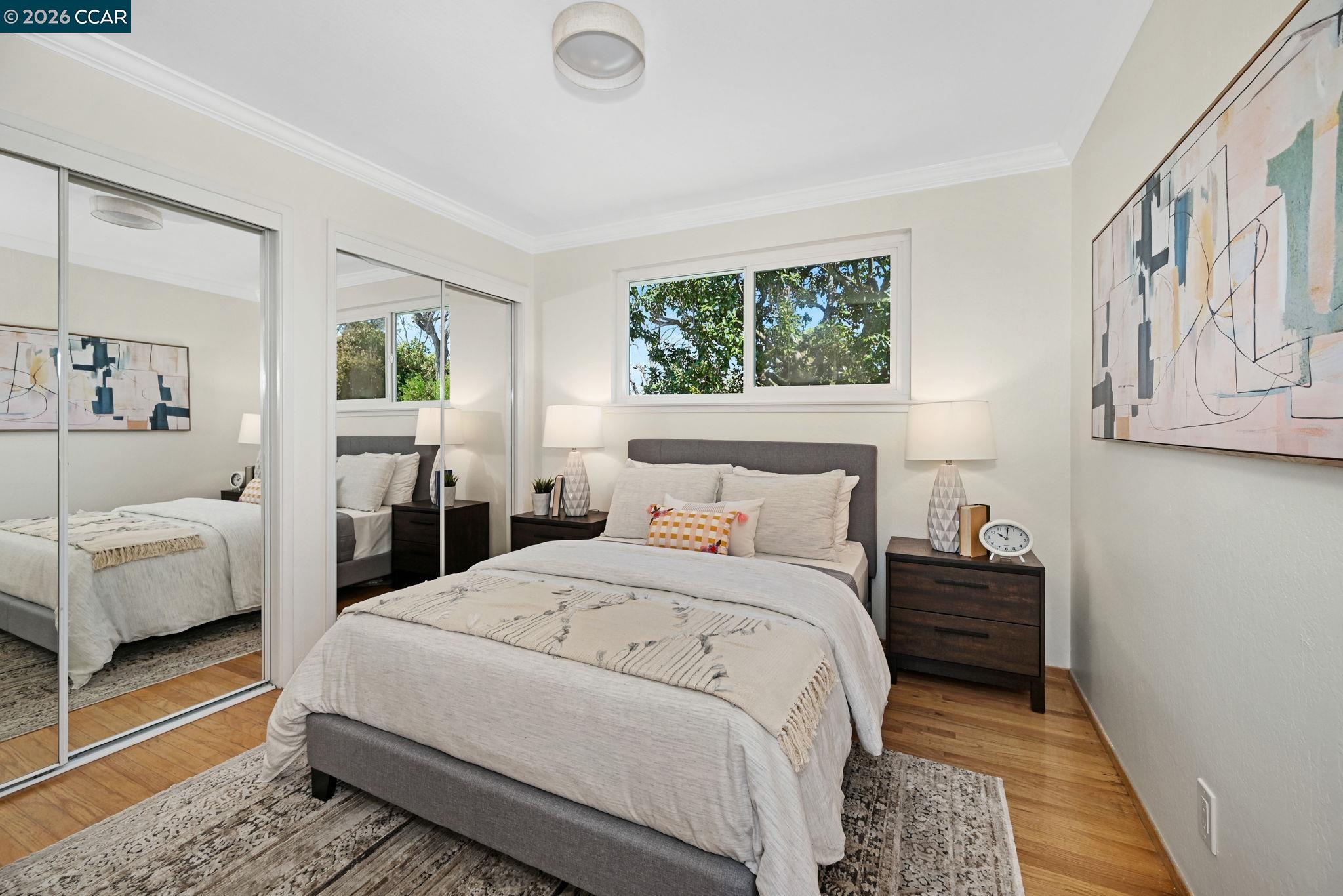 414 Peppertree Road Walnut Creek, CA 94598 - Photo 22 of 49 a bedroom with a bed and a couch