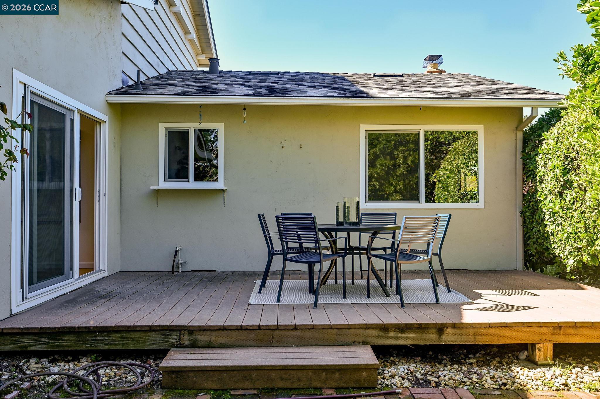 414 Peppertree Road Walnut Creek, CA 94598 - Photo 29 of 49 a view of a patio with table and chairs