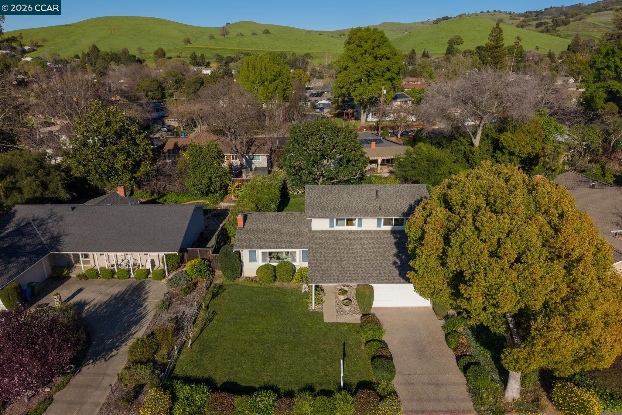 414 Peppertree Road Walnut Creek, CA 94598 - Photo 36 of 49 an aerial view of a house with a mountain