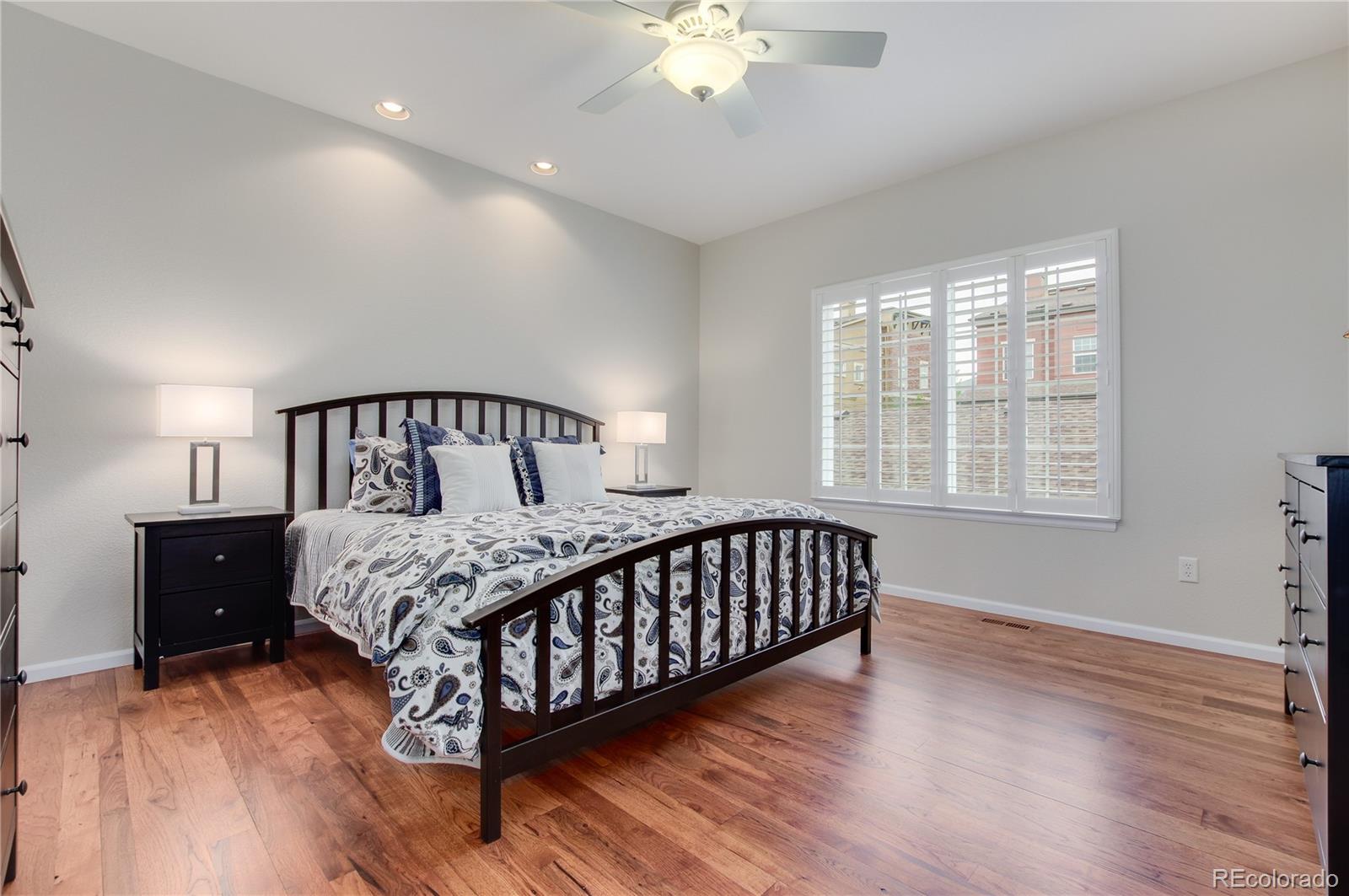 624 Green Ash Street, Unit G Highlands Ranch, CO 80129 - Photo 15 of 40 a bedroom with a bed and window