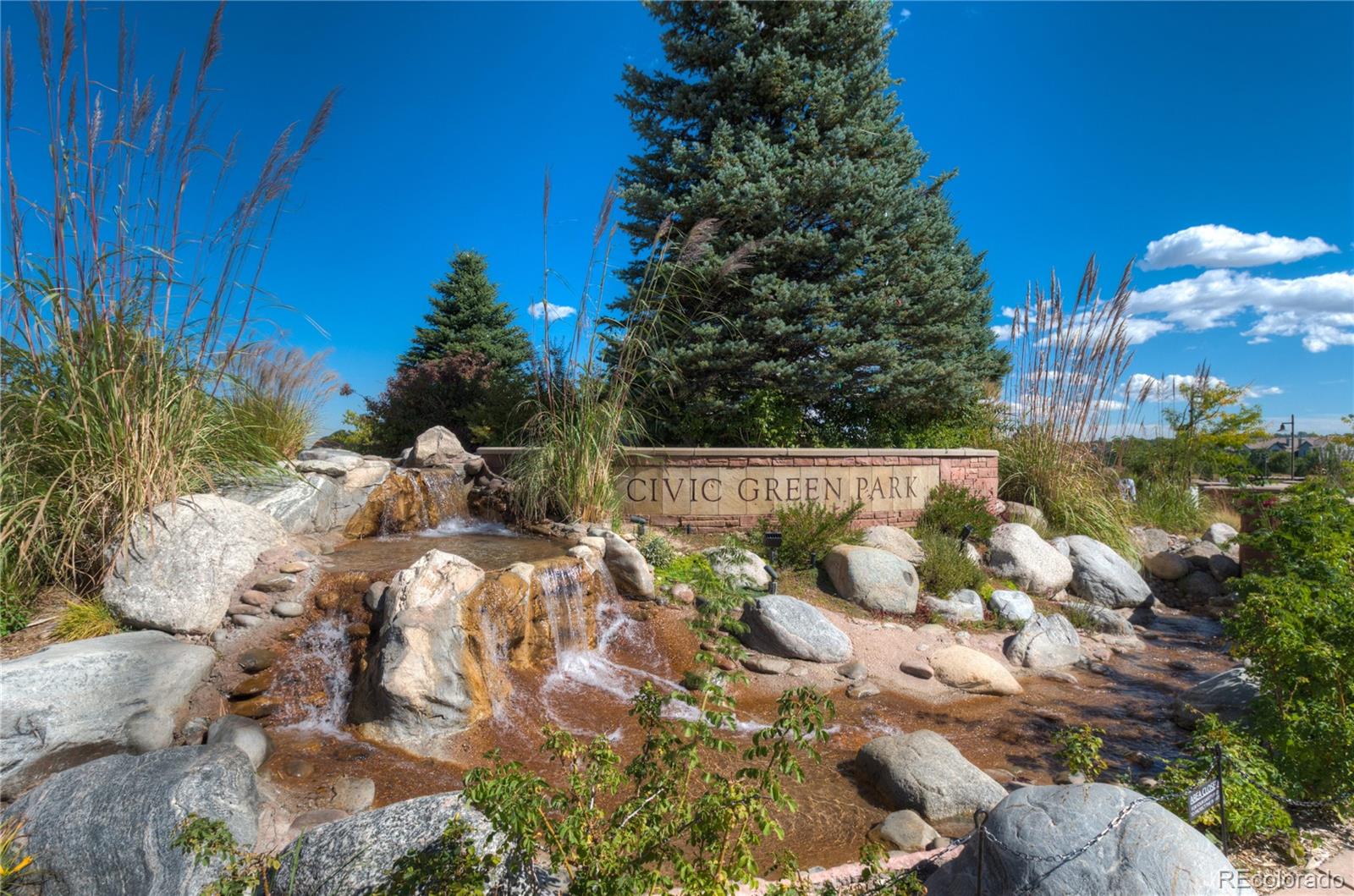 624 Green Ash Street, Unit G Highlands Ranch, CO 80129 - Photo 33 of 40 a view of a yard with plants