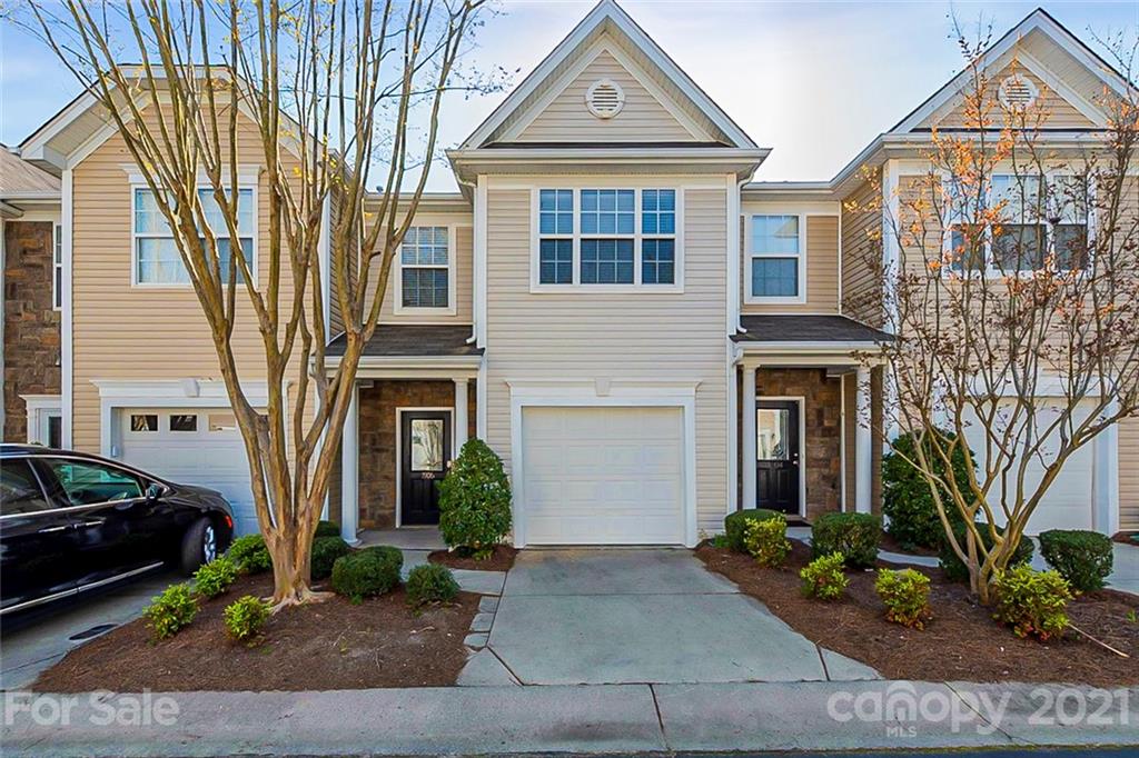 1906 Travertine Lane Fort Mill, SC 29708 - Photo 1 of 17 a front view of a house with garden