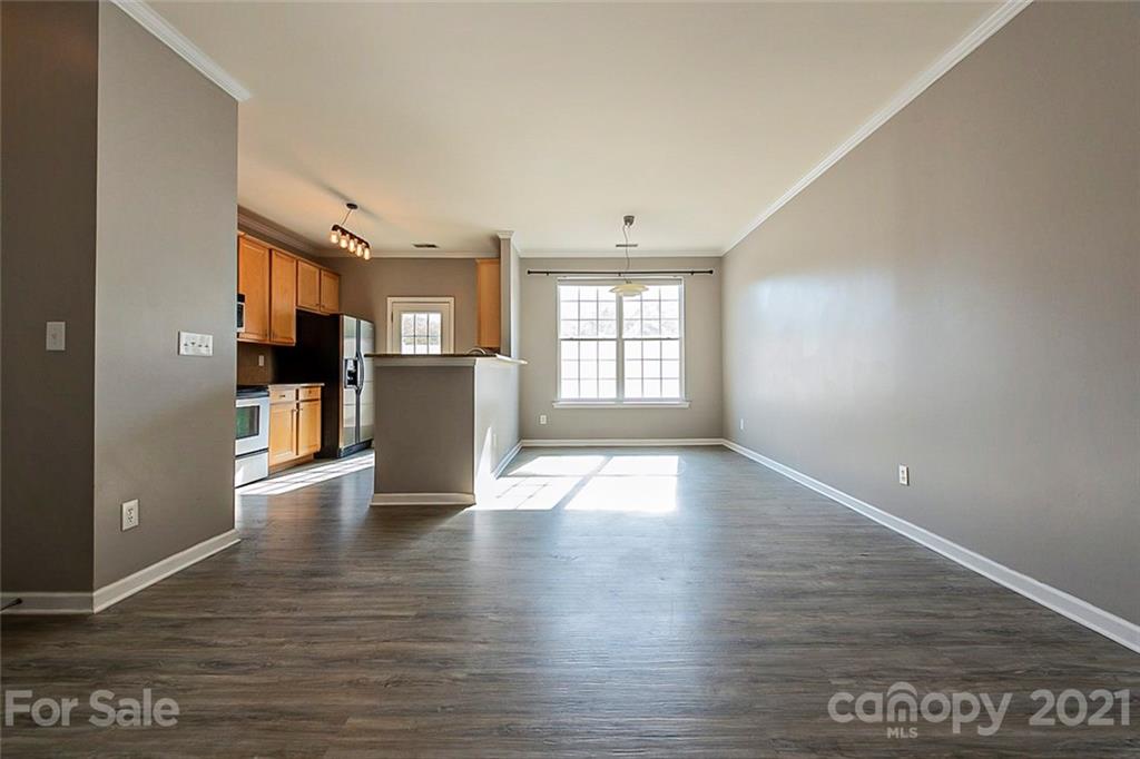 1906 Travertine Lane Fort Mill, SC 29708 - Photo 11 of 17 a view of a kitchen with an empty space and a window