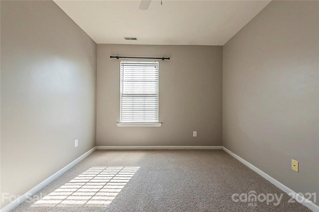 1906 Travertine Lane Fort Mill, SC 29708 - Photo 13 of 17 an empty room with windows
