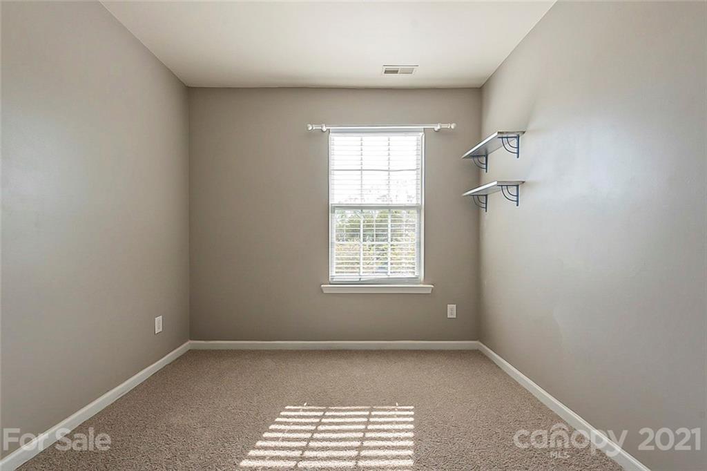 1906 Travertine Lane Fort Mill, SC 29708 - Photo 15 of 17 an empty room with a window