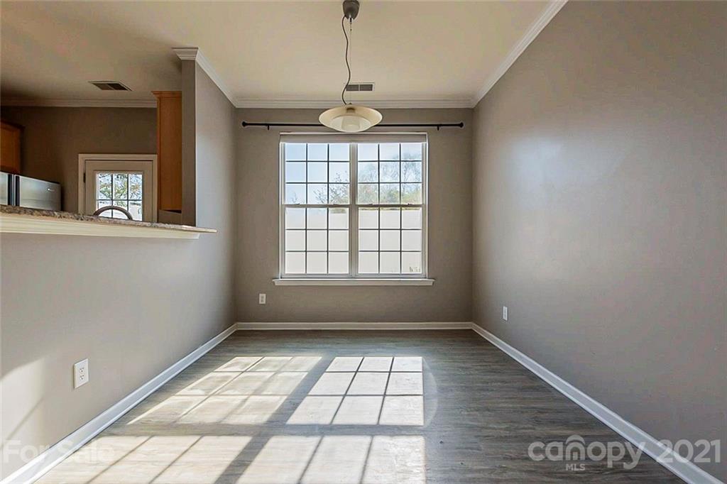 1906 Travertine Lane Fort Mill, SC 29708 - Photo 10 of 17 a view of an empty room with a window